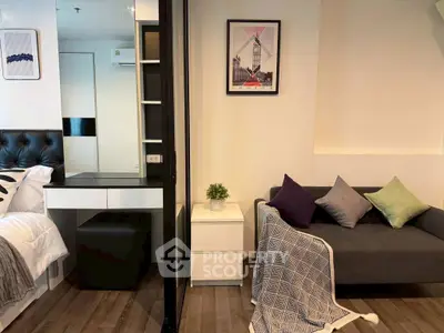 Modern studio apartment with stylish decor and cozy living area, perfect for urban living.