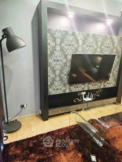 Stylish living room with modern TV setup and elegant decor