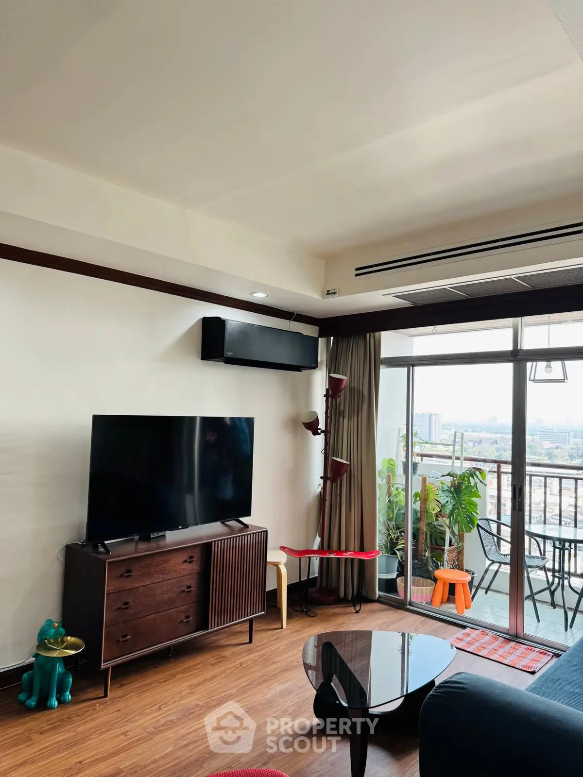 Stylish living room with balcony view and modern decor