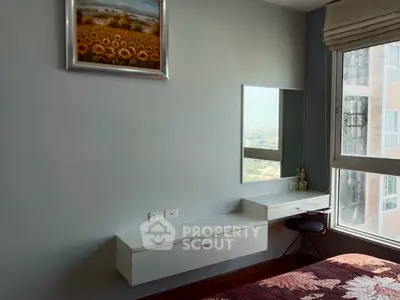 Cozy bedroom with city view and modern decor