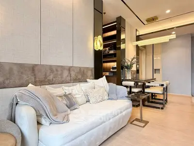 Luxurious modern living room with elegant decor and cozy seating area