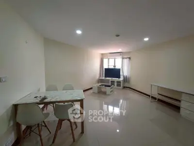 Spacious living room with modern furniture and natural light