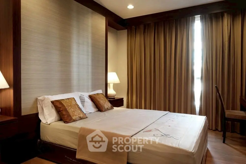 Elegant bedroom with warm lighting and stylish decor