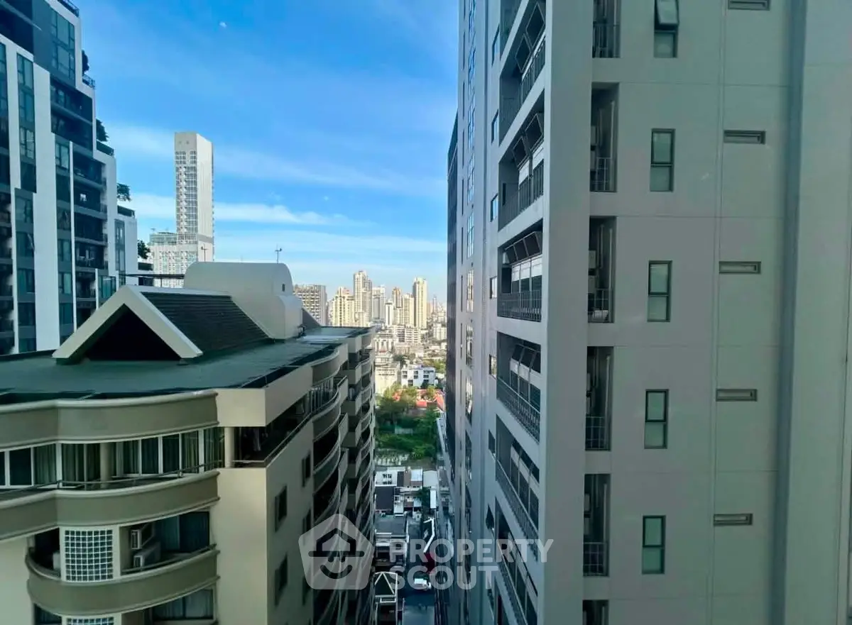 Stunning urban view between modern high-rise buildings in a vibrant cityscape.