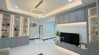 Elegant living room with modern built-in shelves and stylish lighting
