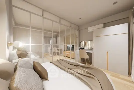 Luxurious bedroom with elegant decor and mirrored wardrobe in modern apartment.
