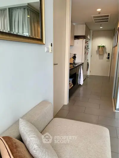 Modern apartment interior with cozy living area and sleek kitchen design