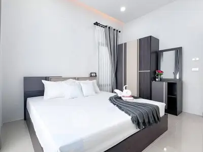 Modern bedroom with sleek furniture and elegant decor
