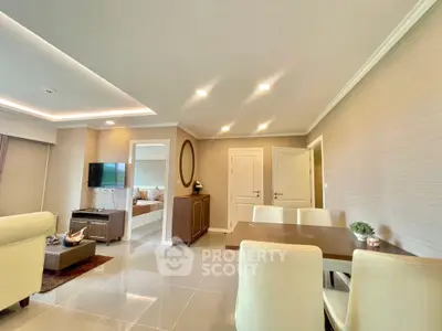 Modern living room with elegant dining area and stylish decor