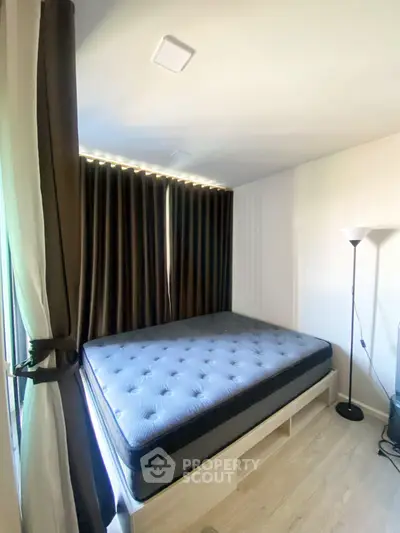 Cozy bedroom with modern decor and natural light