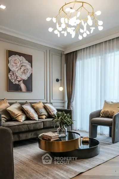 Luxurious living room with elegant decor and modern chandelier