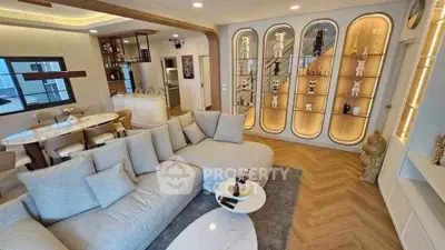 Luxurious modern living room with elegant decor and open kitchen layout