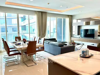 Luxurious modern living room with elegant dining area and pool view