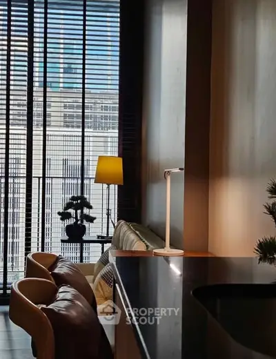 Stylish modern living room with city view and elegant furnishings