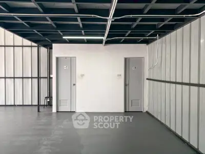 Spacious industrial-style storage unit with modern design and ample space.