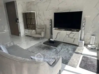 Luxurious modern living room with marble walls and sleek furniture