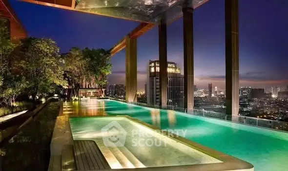 Luxurious rooftop pool with stunning city skyline view at night, perfect for upscale living.