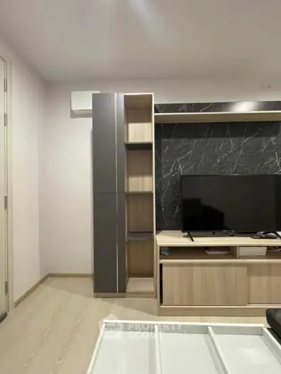 Modern living room with sleek TV unit and stylish decor