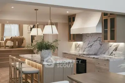 Luxurious open kitchen with marble countertops and elegant lighting