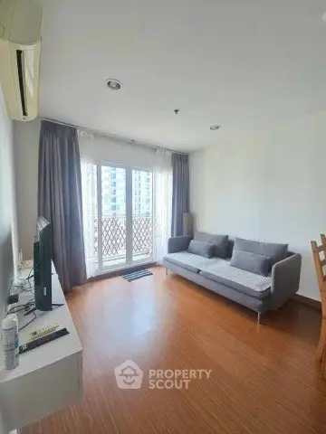 Bright living room with modern sofa and large window balcony view