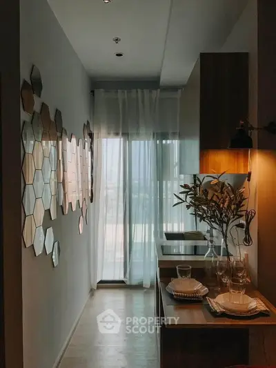 Chic modern kitchen with hexagonal wall decor and natural light