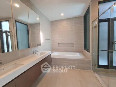Luxurious modern bathroom with sleek design and spacious layout