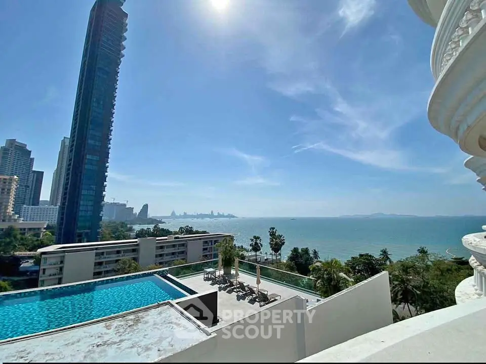 Stunning ocean view from luxury high-rise with pool and city skyline