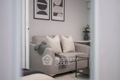 Cozy living room with modern decor and comfortable seating