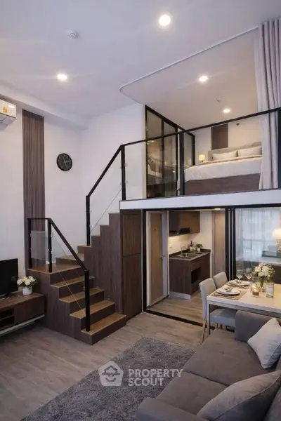 Modern loft apartment with stylish living area and mezzanine bedroom