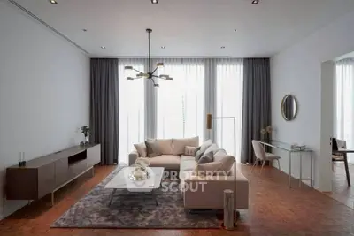 Elegant modern living room with stylish furniture and natural light