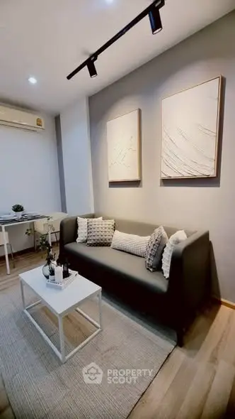 Modern living room with stylish decor and cozy seating area