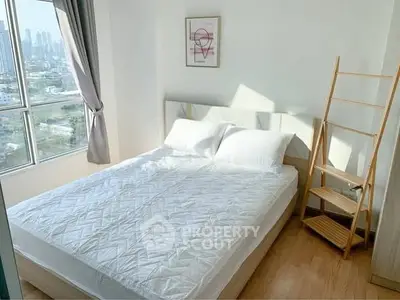 Bright bedroom with large window and city view, featuring a cozy bed and minimalist decor.