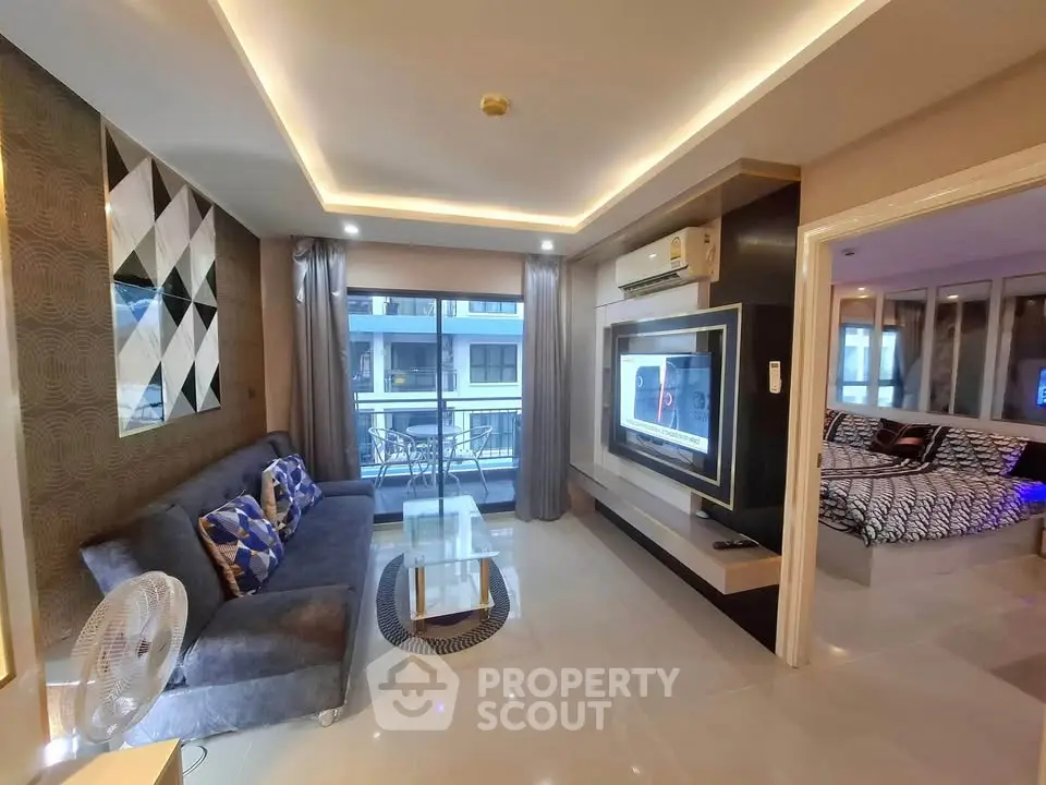 Modern living room with stylish decor and balcony view