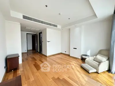 Spacious living room with wooden flooring and modern design