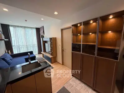 Modern living room with sleek furniture and ample natural light