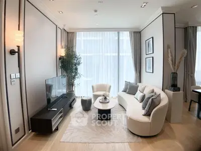Elegant living room with modern decor and large windows for natural light.