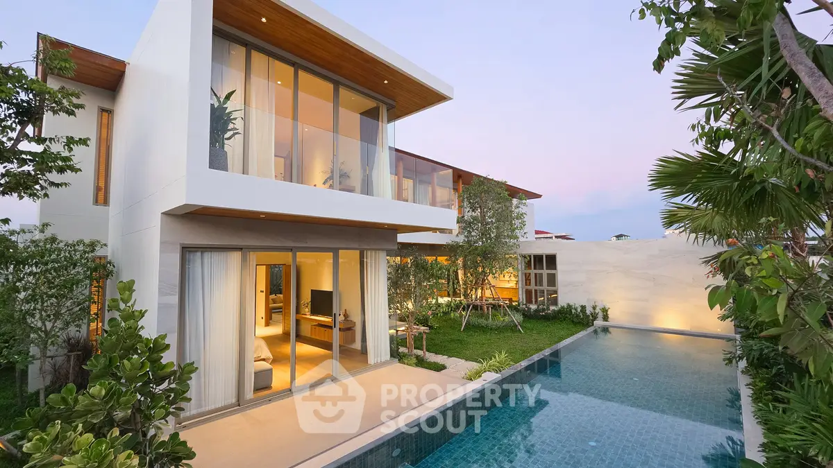 Luxurious modern villa with private pool and lush garden, perfect for serene living.