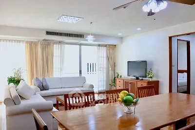 Spacious living room with elegant decor and natural light