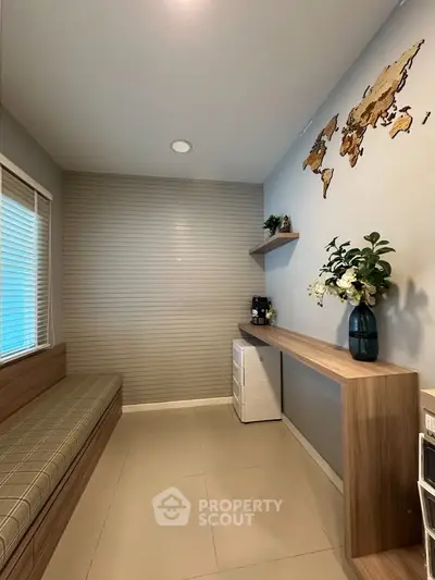 Modern study room with built-in desk and world map decor