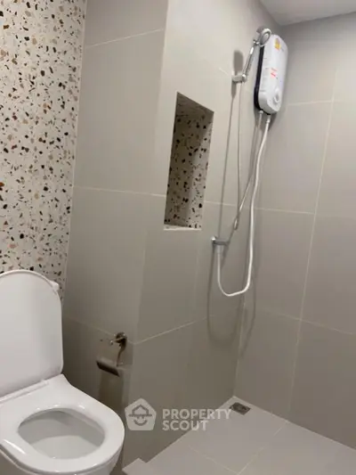 Modern bathroom with sleek shower and stylish tile design