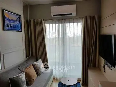 Cozy living room with modern decor and natural light