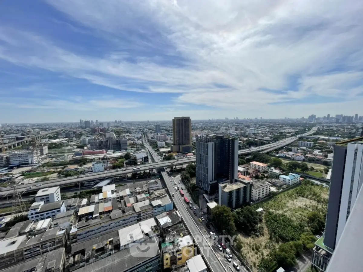 Stunning cityscape view from high-rise building showcasing urban skyline and expansive horizon.