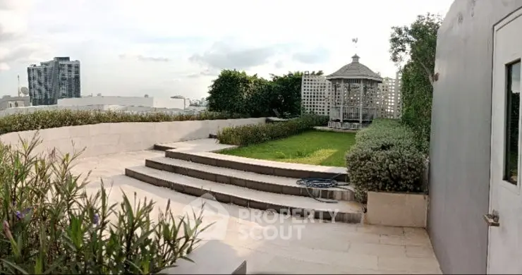 Stunning rooftop garden with gazebo and panoramic city views, perfect for relaxation and entertaining.
