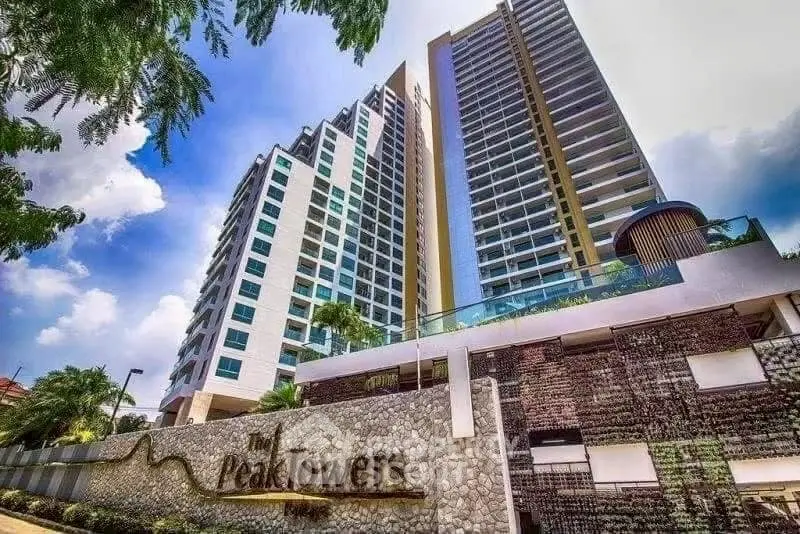 Stunning high-rise residential towers with modern architecture and lush landscaping.
