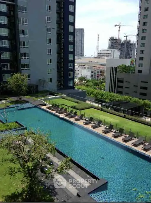 Luxurious apartment complex with stunning pool and city view