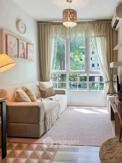 Charming living room with cozy sofa, large window, and elegant decor in a modern apartment.
