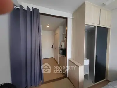 Modern apartment interior with open layout and stylish storage solutions.