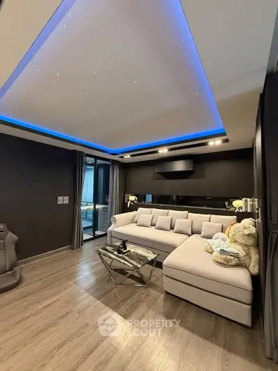 Luxurious living room with modern lighting and plush seating
