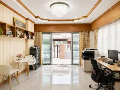 Spacious home office with modern decor and natural light