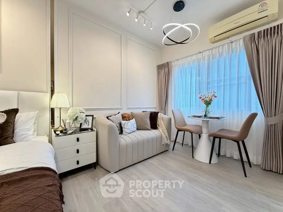 Modern living room with elegant decor and cozy seating area